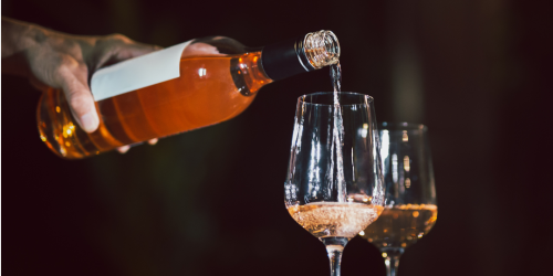 wine being poured in glass